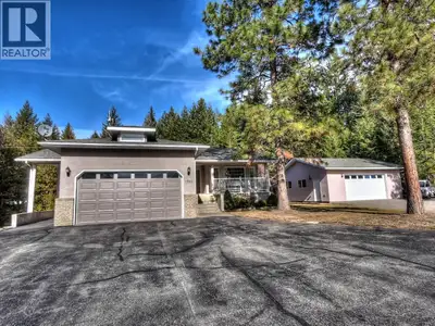 Visit REALTOR® website for additional information. Situated on a gorgeous PARK LIKE 2 plus acres, th...