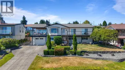 Breathtaking ocean and mountain views greet you from this beautifully updated home in a sought-after...