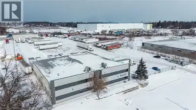 Strategically located near Hwy 403, this expansive property offers 12,583 sq ft of versatile space....