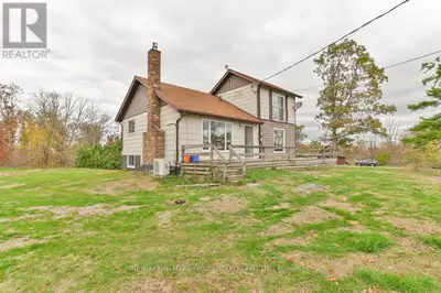 PRIVATE COUNTRY SETTING! Wow imagine being secluded on a quiet 2 ACRE lot with NO neighbours overloo...