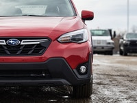 This Subaru is a versatile compact SUV built for both everyday driving and weekend adventures. With... (image 3)