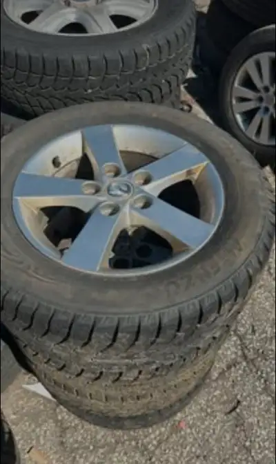 Selling 4 rims and tires for Mazda 3 Winter tires Brand ALTENZA PRICE $350
