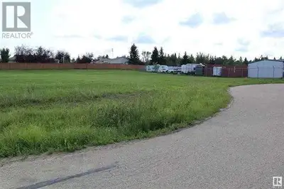 0.72 Acre lot zoned Urban Commercial at Pigeon Lake Village! Services available at the property line...