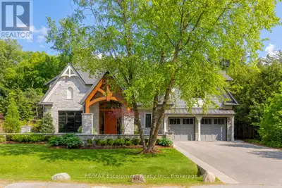 Welcome to 129 Wolfdale Ave, a custom-designed modern craftsman estate, positioned on a premium lot...
