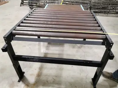 5000 Lb Extra Wide 48 inch between frame gravity conveyor. Each section is 48 inches long and has 10...