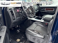 Experience the robust power and commanding presence of the 2012 Ram 3500 Laramie with its stunning d... (image 9)