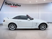 Feel the wind in your hair as you cruise the open road in a Honda S2000. With keyless entry for conv... (image 1)