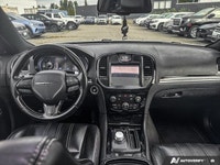 This Chrysler 300 delivers a Regular Unleaded V-6 3.6 L/220 engine powering this Automatic transmiss... (image 9)