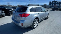 The 2011 Subaru Outback is a versatile wagon-style SUV that's built to handle all kinds of driving c... (image 8)