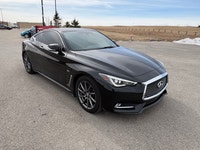 The 2017 Infiniti Q60 Premium is a luxurious 2-door coupe, often featuring a 300-horsepower 3.0L twi... (image 2)