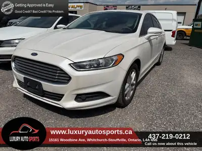 Welcome to LUXURY AUTO SPORTS. RELIABLE 2013 FORD FUSION SE, FINISHED IN WHITE OVER BLACK INTERIOR,...