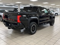 Engineered for drivers who want capability without compromising conscience, this 2025 Toyota Tacoma... (image 5)
