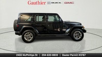 The 2022 Jeep Wrangler Unlimited Sahara is a versatile 4-door SUV that blends classic Jeep off-road... (image 1)