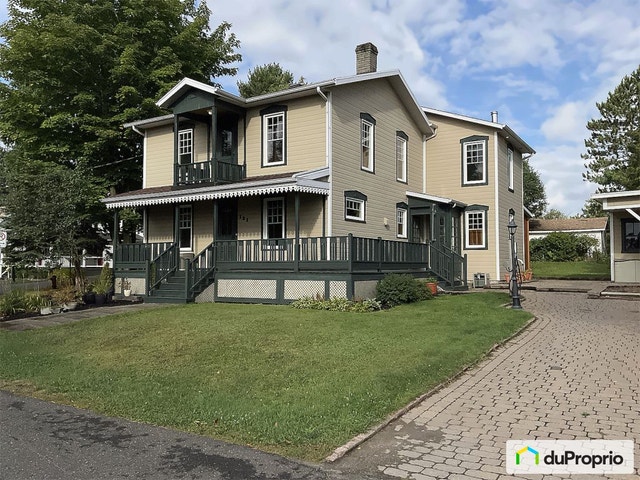 $449,900 - 2 Storey for sale in St-Redempteur — photo 1