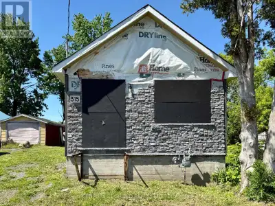 This bungalow has been gutted and has had some renovations such as electric & drywall and some plumb...