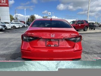 Experience the thrill of driving the 2023 Honda Civic Sedan Touring, a certified pre-owned beauty wi... (image 5)
