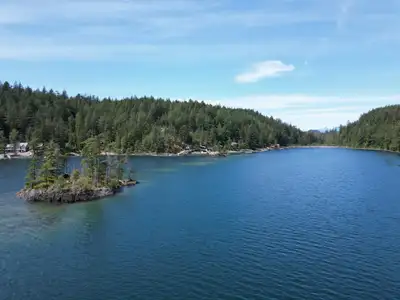 Cozy west coast contemporary cabin nestled in the serene embrace of Blind Bay. The property boasts a...