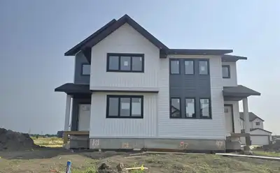 3M//Winnipeg/The Serenity model is certified energy efficient side by side home embodies the perfect...