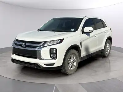 The 2021 Mitsubishi RVR SE in stunning white with front-wheel drive offers an impressive drive exper...