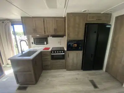 Keystone Springdale travel trailer 380DB highlights: Two Bedrooms Triple slides Patio Door Flex Loun...