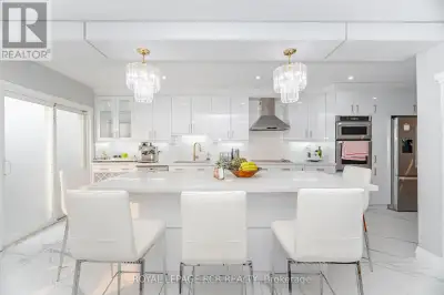 127 Tiller Trail has it all!! Welcome to this meticulously upgraded, 4+2 bedroom, 4 bathroom semi-de...