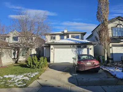 THREE BEDROOM HOUSE WITH LARGE DECK AND CLOSE TO MULTIPLE SCHOOL