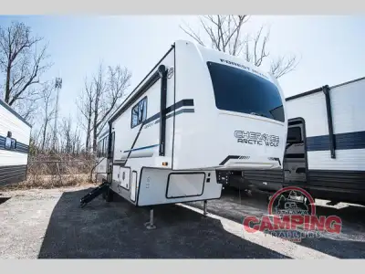 Forest River Cherokee Arctic Wolf Suite fifth wheel 3250SUITE highlights: Fireplace King Bed Deluxe...