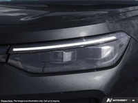 This Volkswagen Tiguan has a trusty Intercooled Turbo Regular Unleaded I-4 2.0 L/121 engine powering... (image 8)