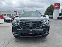Conquer every adventure with the rugged yet refined 2023 Honda Passport TrailSport, a vehicle engine... (image 1)