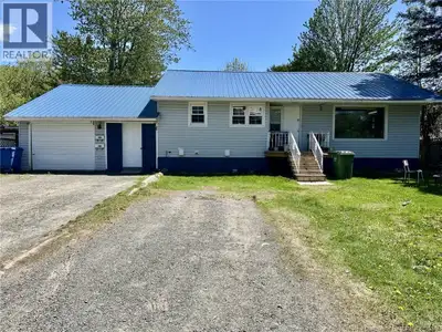 'INCOME POTENTIAL'! WONDERFUL package with spacious 3 bedroom main level and lower unit with two! Ma...
