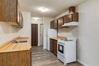 Amenities: Spacious Rooms • Balconies • Heat & Water Included Suite & Building: One-bedroom and two-... (image 2)