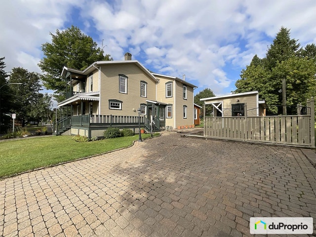 $449,900 - 2 Storey for sale in St-Redempteur — photo 2