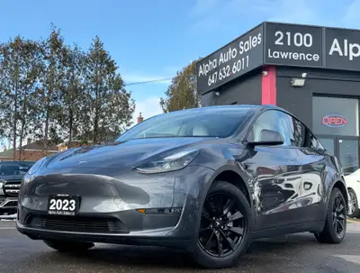 Tesla Model Y Long Range AWD - Midnight Silver Metallic Exterior on White Premium Interior - Carfax...