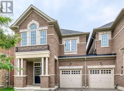 Gorgeous End-Unit Executive Townhome Attach To Another Side With Only Garage! This Remington Built 4...