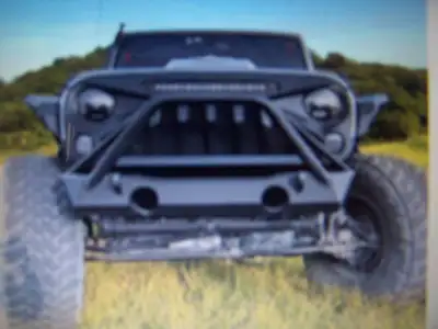 The American Modified Front Gladiator Vader Grille is a striking accessory that instantly transforms...