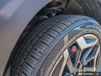 The 2025 Kia Seltos X-Line AWD in a striking gray finish with an automatic transmission offers confi... (image 7)