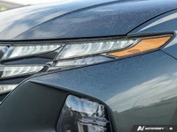 The expansive panoramic sunroof of this 2023 Hyundai Tucson Preferred offers breathtaking views, tra... (image 9)