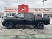 This striking 2023 Ram 1500 Classic SLT Crew Cab Pickup in Diamond Black Crystal Pearl with a Diesel... (image 9)