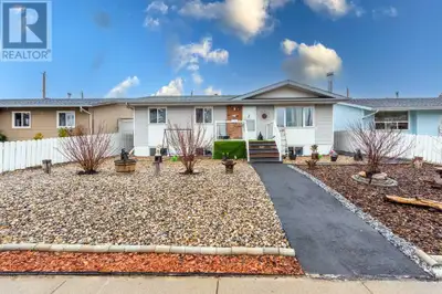 **Beautifully Updated 5-Bedroom Bungalow with Double Detach Garage, RV Parking, and Covered Deck on...