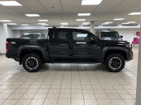 Engineered for drivers who want capability without compromising conscience, this 2025 Toyota Tacoma... (image 6)