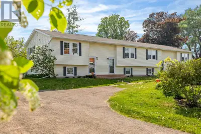 Unit #1, 14 Marshall St. Newly Renovated End Unit, a charming 2-bedroom, 1-bathroom split-entry cond...