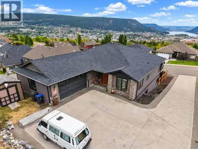 CUSTOM Westridge home with incredible panoramic views of Williams Lake, the city & surrounding mount...