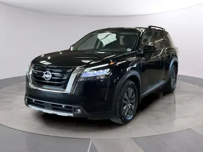 The 2024 Nissan Pathfinder SV 4WD, presented in a striking color that complements its rugged 44 driv...