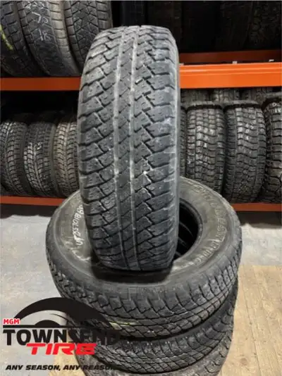 SET OF FOUR USED BRIDGESTONE DUELER A/T TIRES, 255/70R18 SOLD AS SET OF FOUR ONLY, PRICE INCLUDES IN...