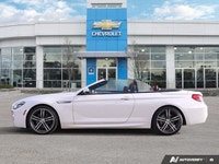 Experience the thrill of open-air driving in this stunning 2018 BMW 6 Series 650i xDrive Convertible... (image 1)