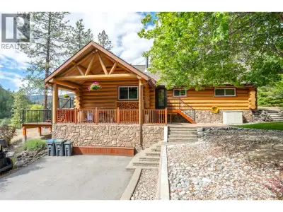 GOLF COURSE LIVING AT ITS FINEST! Nestled among the trees in a peaceful, private setting overlooking...