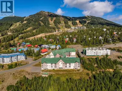 Experience four-season mountain living in this bright and spacious 3 bed, 2 bath top-floor suite ove...