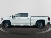 Welcome to Capital GMC! Looking for more luxury in the All New GMC Sierra? This 4WD White Sierra SLT... (image 1)
