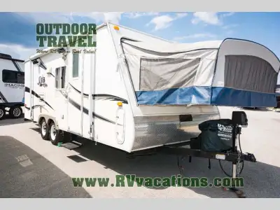 Nice hybrid trailer with two tip outs and a slide out making it a very spacious trailer when all ope...
