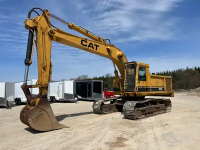 Iron Inventory Inc! 1973-1986 Caterpillar 235 excavator powered by a cat diesel engine. Enclosed cab...